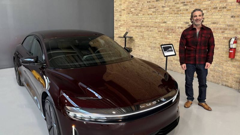 Lucid Air next to person