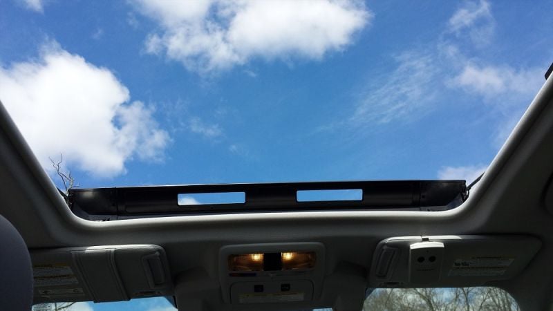 Image of a large glass moonroof by John Goreham