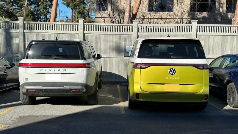 White Rivian R1s next to Yellow Volkswagen ID. Buzz