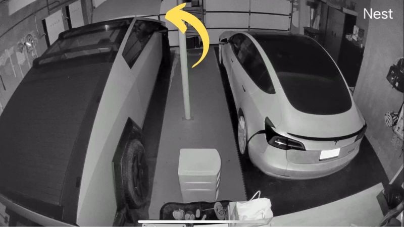 Tela Cybertruck's frunk opens by itself in a garage