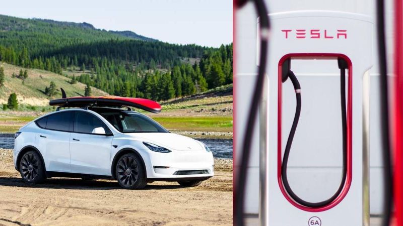 White Tesla Model Y next to Supercharger 