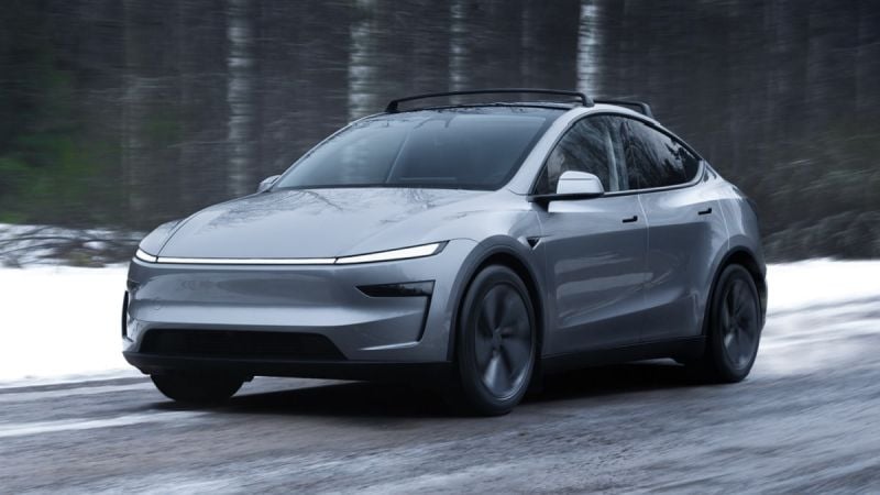 Tesla Model Y driving on a winter road
