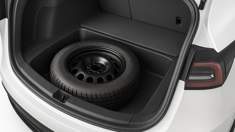 Tesla Model Y with spare tire in lower trunk