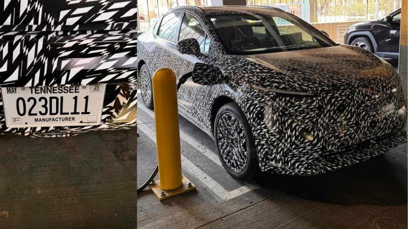 A camouflaged car with a Tennessee manufacturer plate is parked in a garage, partially visible alongside a charging station.
