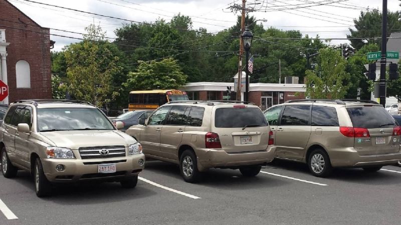 Image of gold Toyotas by John Goreham