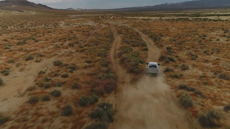 Ford Bronco driving in a desert