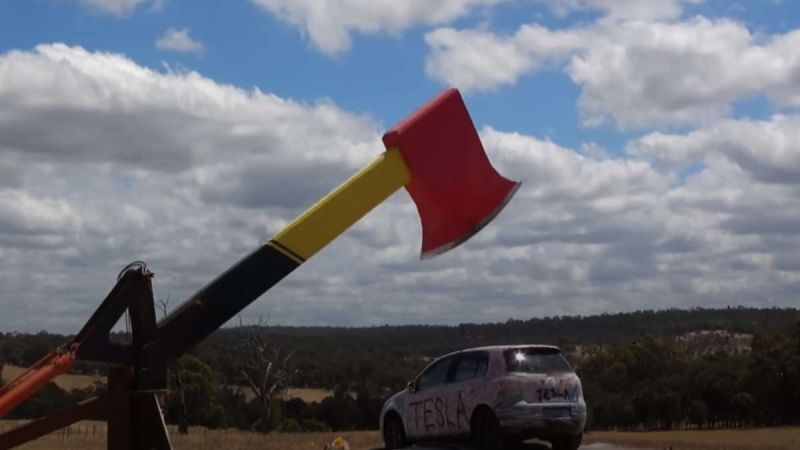 Can a Tesla Withstand the Foce of a Giant Axe?