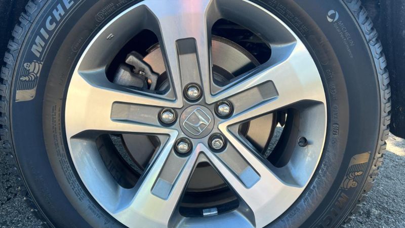 Image shows new Michelin CrossClimate 2 all-weather tires mounted on a 2024 Honda Pilot