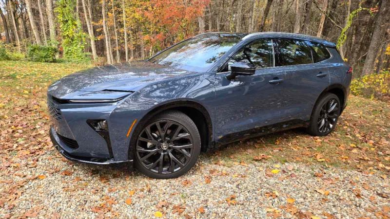 2026 Toyota Crown Signia looks like a wagon in a rural setting with fall foliage