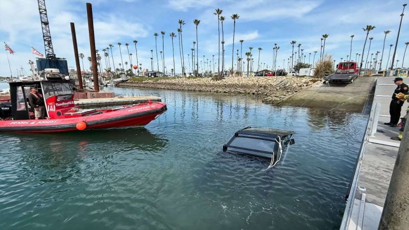 A Tesla Cybertruck is shown completely submerged in water in Ventura California
