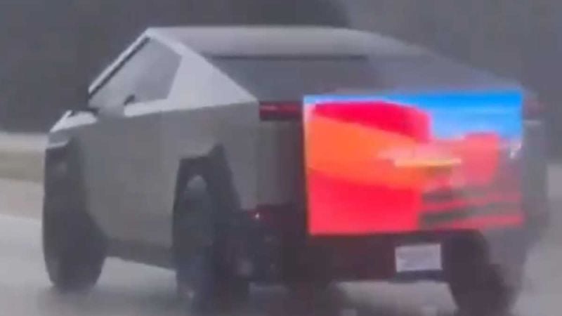 Strange Video Shows Cybertruck Driving On The Freeway With a TV On Back, Playing Some Kind Of Video: What Is It?