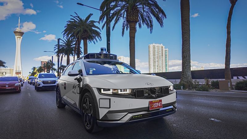 Hyundai Ioniq 5 robotaxi driving in Las Vegas with autonomous sensors and cameras