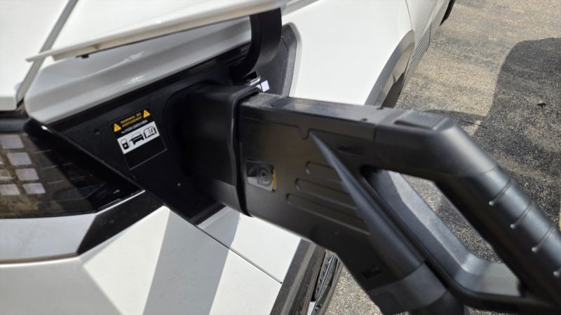 2025 Hyundai Ioniq 5 Limited shown DC charging using an NACS to CCS adapter