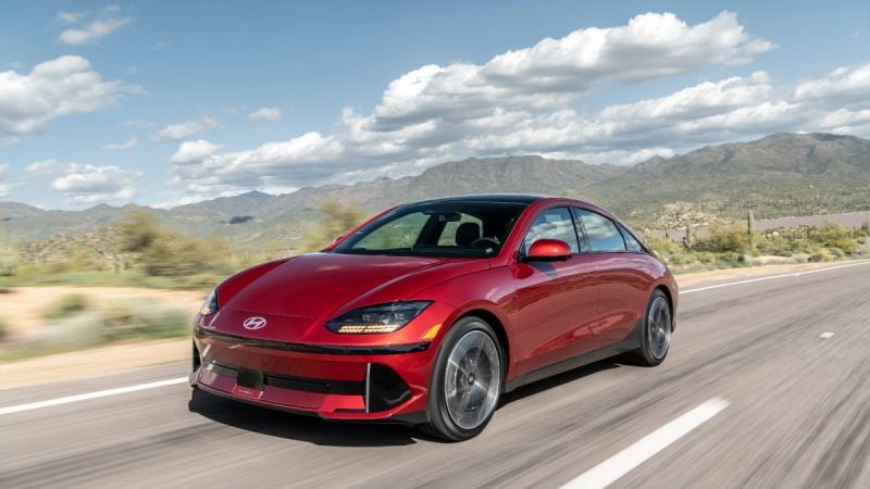 A stunning 2024 Hyundai Ioniq 6 Limited is shown tearing up a dessert road.