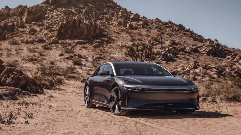 A Lucid Air Grand Touring is pictured parked in the desert.