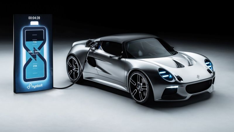 Image showing the Nyobolt EV in silver plugged into a charger.