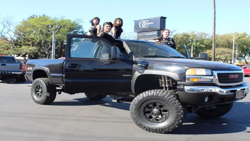 OC Auto Dealership's Team selling diesel trucks