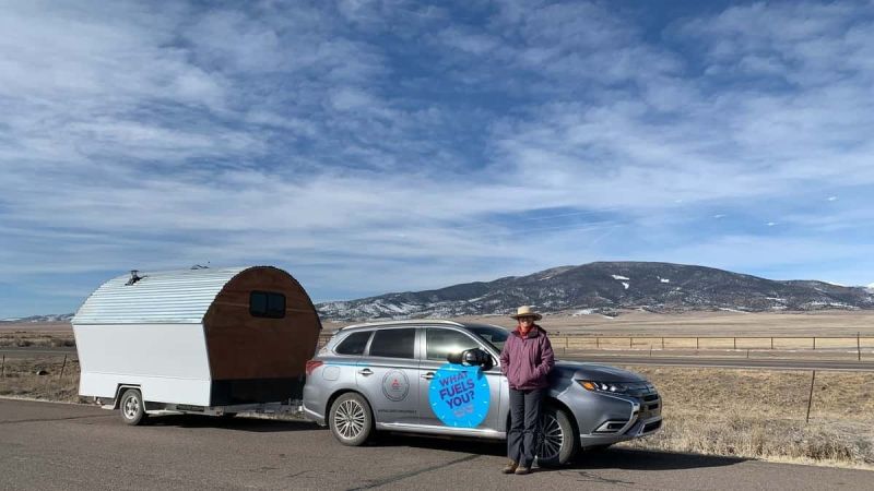 Image of Outlander PHEV towing tiny house courtesy of Mitsubishi
