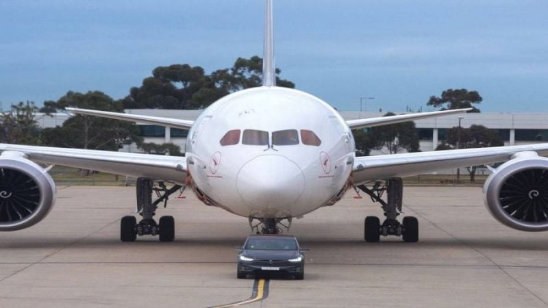 Tesla Model X Towing a Qantas Boeing Dreamliner