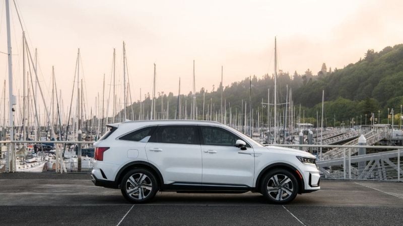 White Kia Sorento PHEV with sailboats in background