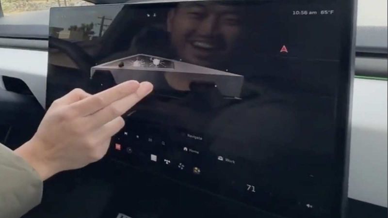 Tesla Easter Egg Gives Nod To Cybertruck Broken Glass From Steel Ball As Tapping the Cybertruck Display a Few Times Causes It To "Crack"