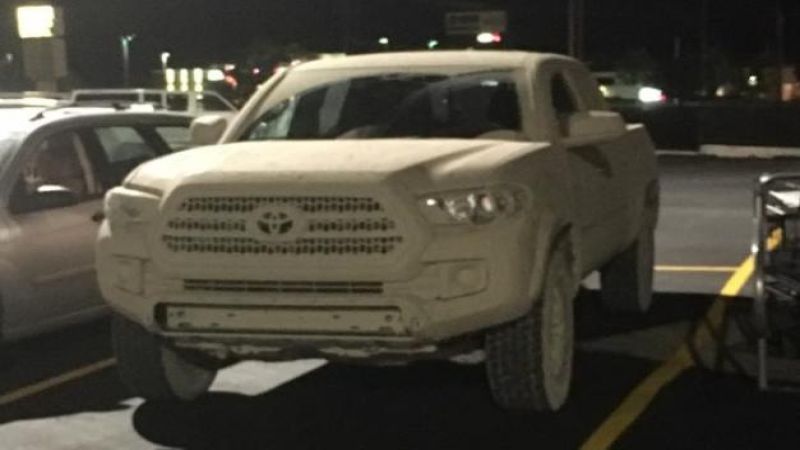 Inferno Toyota Tacoma covered white