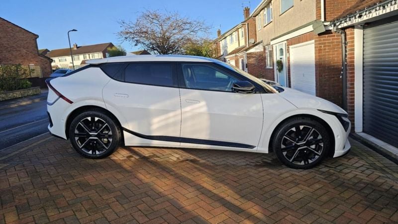 White Kia EV6 outside of owner’s home