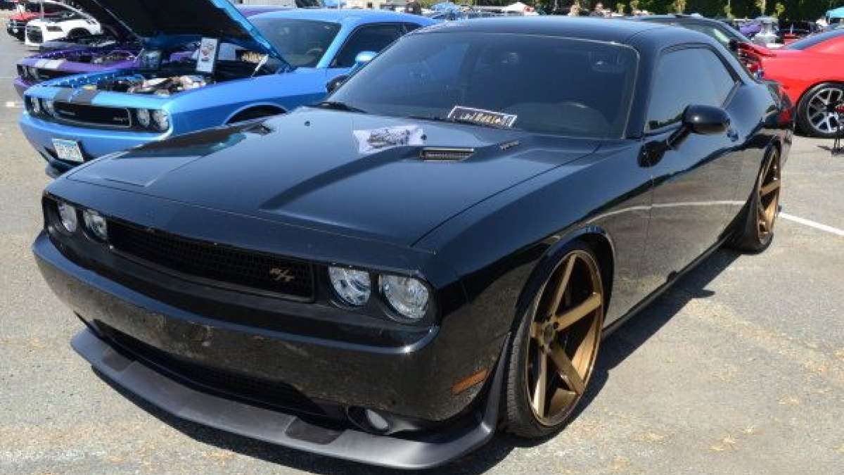 black challenger gold wheels