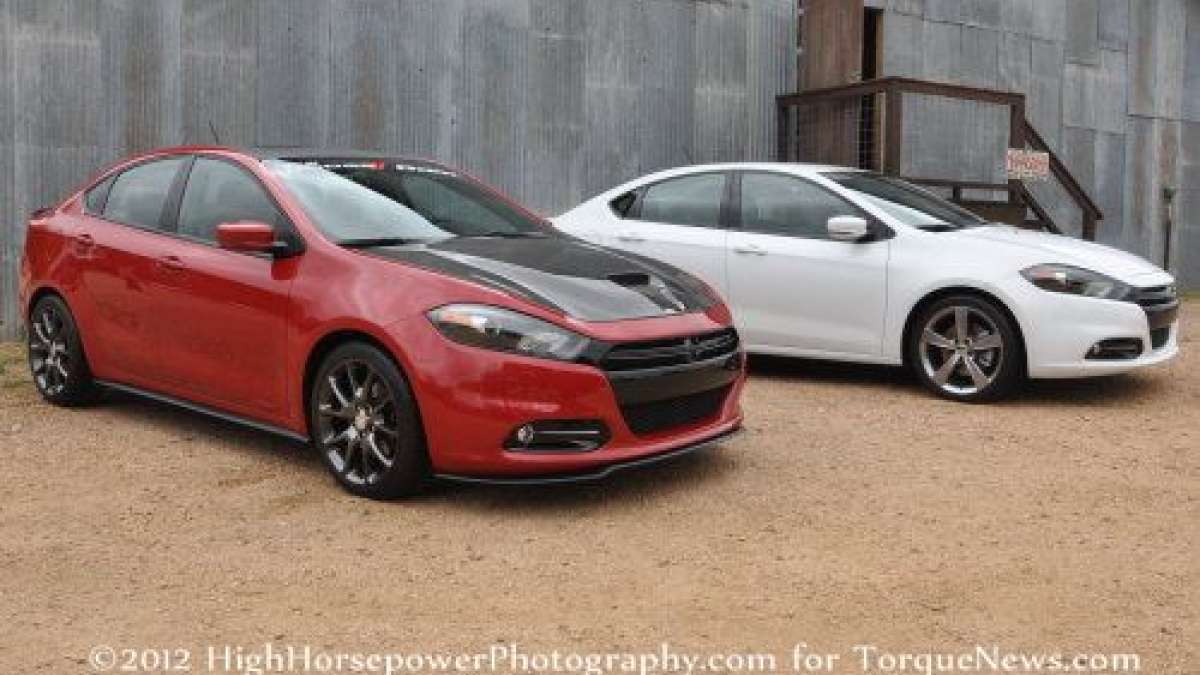 A pair of 2013 Dodge Dart sedans