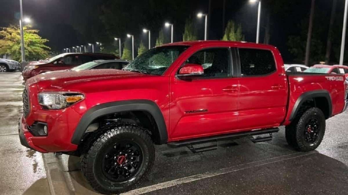 2020 Toyota Tacoma TRD Off-Road Barcelona Red double cab profile view front end