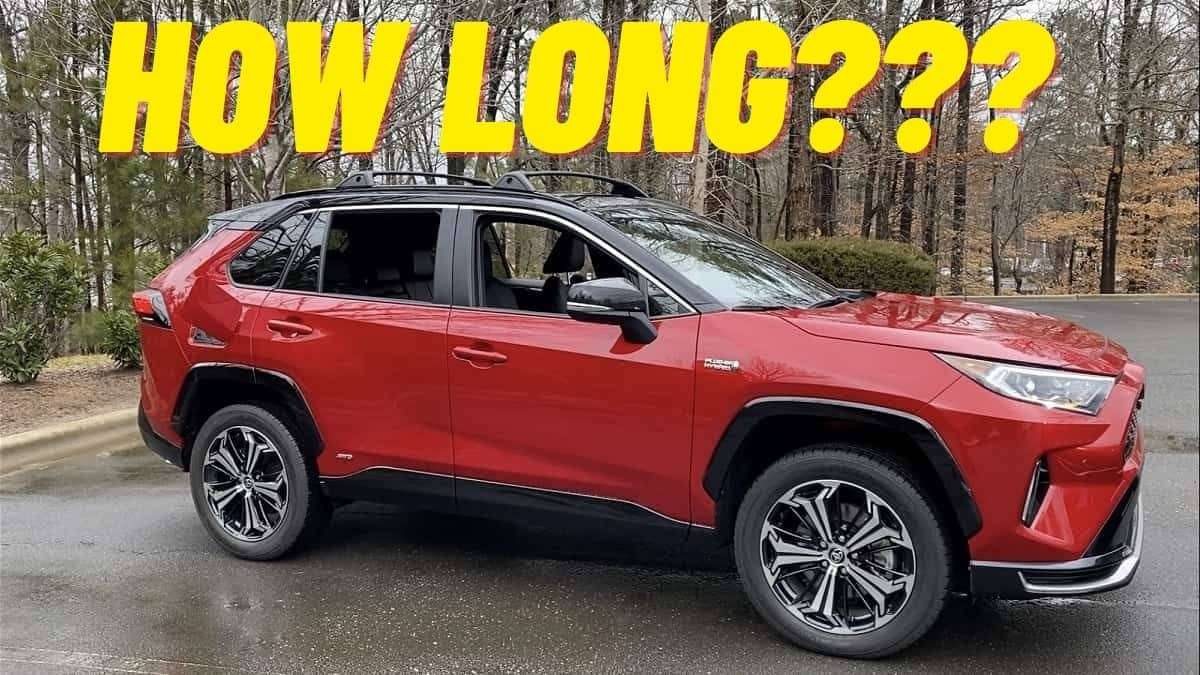 2021 Toyota RAV4 Prime XSE Supersonic Red profile view and front end