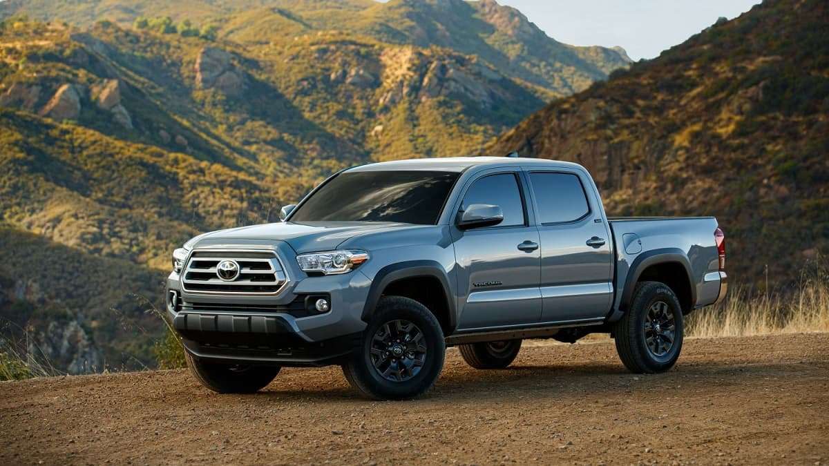 2021 Toyota Tacoma Trail Edition Cement color front end and profile view