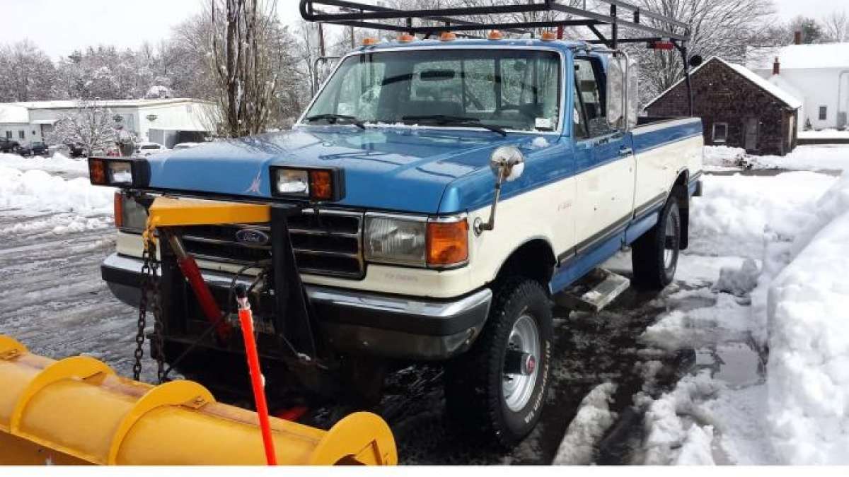 This Ford F-350 has plowed for more years than you will believe.  