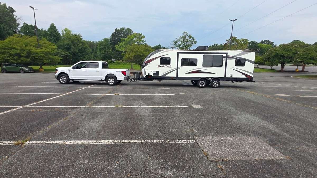 A Ford F-150 PowerBoost Replaced His Ram 2500, Then Towed a 32-Foot, 6,500-Pound Camper at 9 to 11 MPG