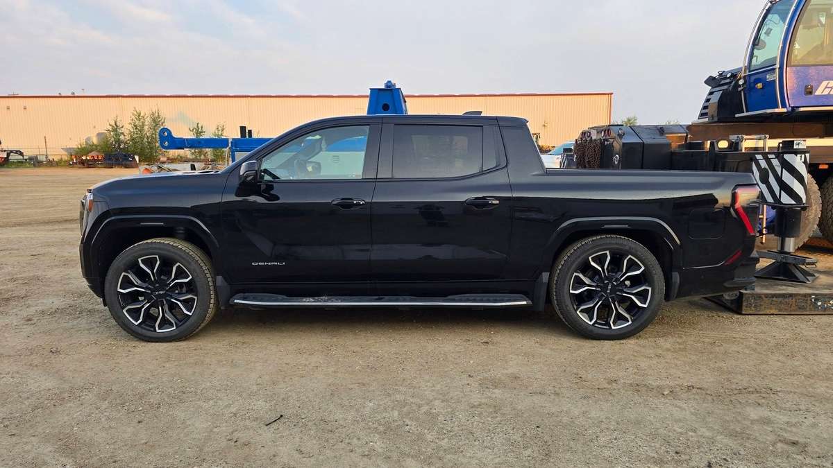 A GMC Sierra EV Carried 1,500 Pounds of Concrete at 2.0 Mi/kWh, but Its Driver Says It Was Over Payload