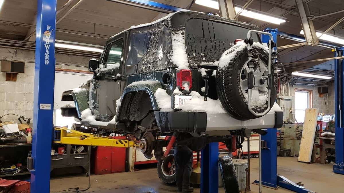 Jeep Wrangler on lift image by John Goreham