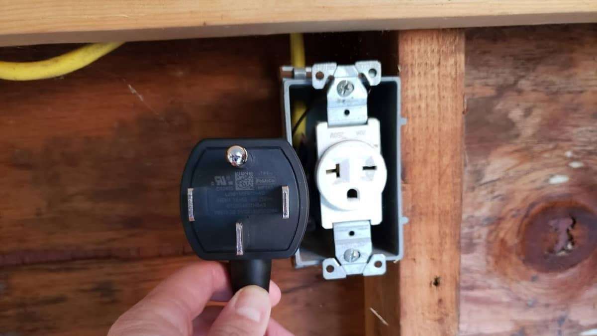 Image of EV charger and plug by John Goreham