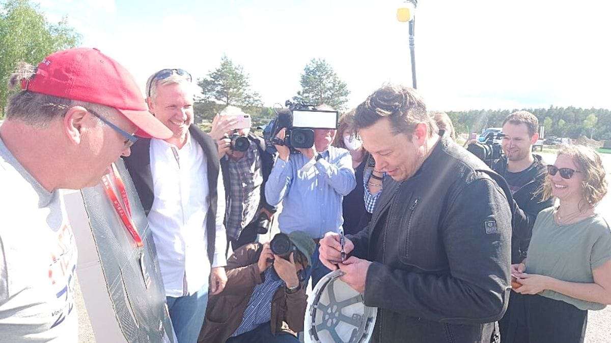 Tesla CEO Elon Musk chatting with Tesla suporters at Giga Berlin car factory