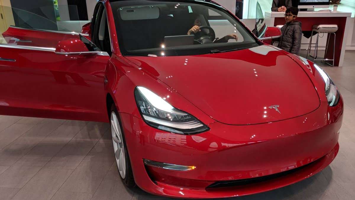 Tesla Model 3 red color 1200x900