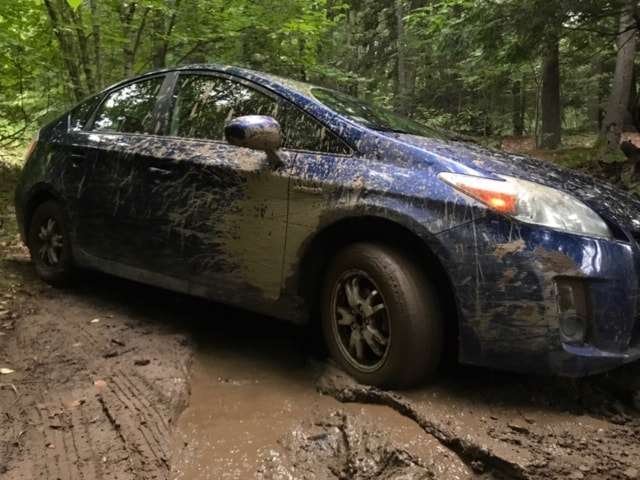 Toyota Prius stuck in the mud