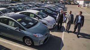 Toyota Prius on dealer lot getting sold