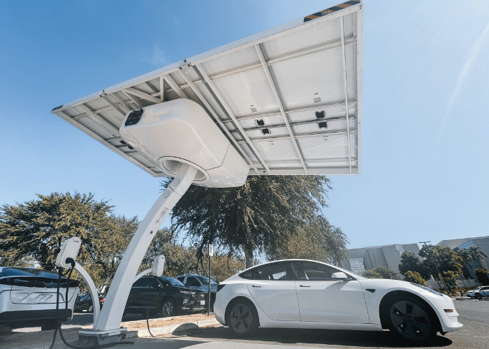  white tesla model 3 at a solar charging station in California