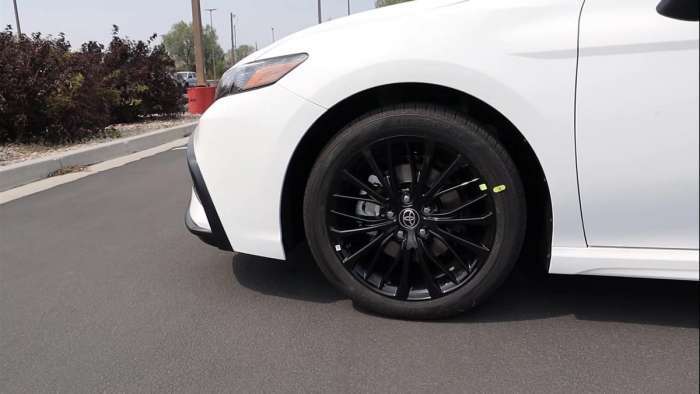 2022 Toyota Camry Hybrid Nightshade Super White profile view black wheels