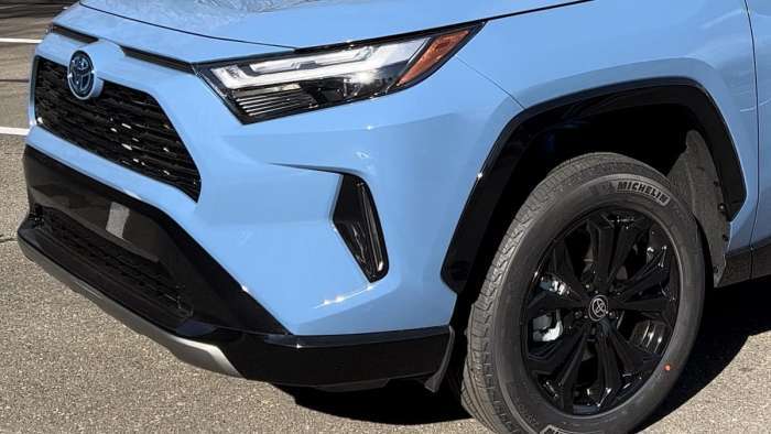 2022 Toyota RAV4 Hybrid XSE Cavalry Blue profile front end headlights wheels