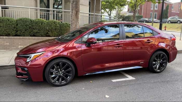 2023 Toyota Corolla Hybrid Ruby Flare Pearl front end profile view