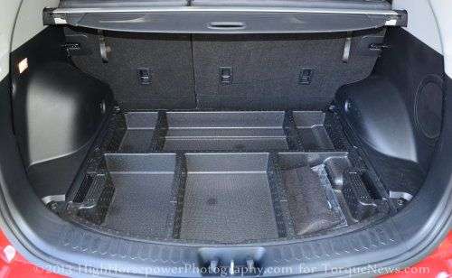 The rear cargo area of the 2013 Kia Sportage SV AWD