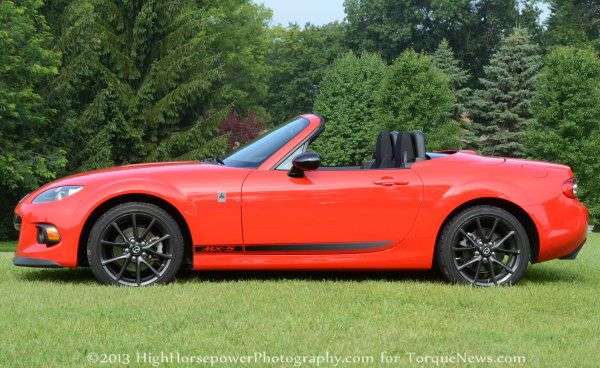 The side profile of the 2013 Mazda MX-5 Club with the top down