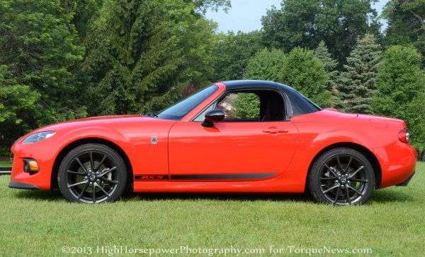 The side profile of the 2013 Mazda MX-5 Club with the top up