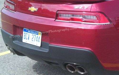 A close up of the rear end of the 2014 Chevrolet Camaro ZL1 Convertible