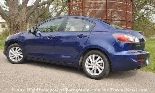 The 2012 Mazda 3i Grand Touring sedan side profile